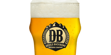 Large glass of beer with the Devils Backbone Brewery logo